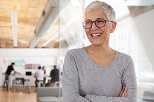 Mature woman smiling in office