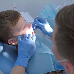 Boy receiving fluoride in Lewisville