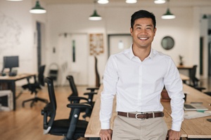 person smiling in an office