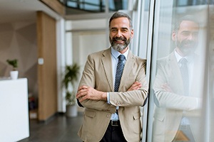 Man smiling at office