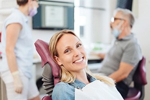 Woman smiling in the dental chair