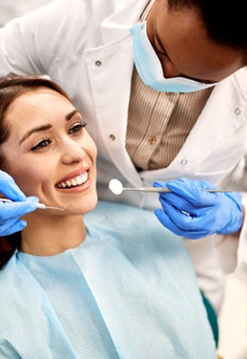 Woman with brown hair about to undergo dental exam