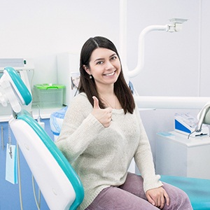 Happy patient at appointment to use her dental insurance in Lewisville