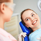 Smiling woman in dental chair