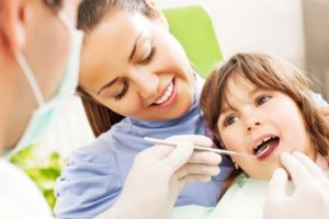 Woman and child at dentist