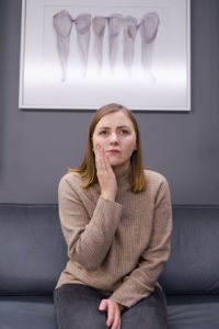 Woman at dentist with a dental emergency