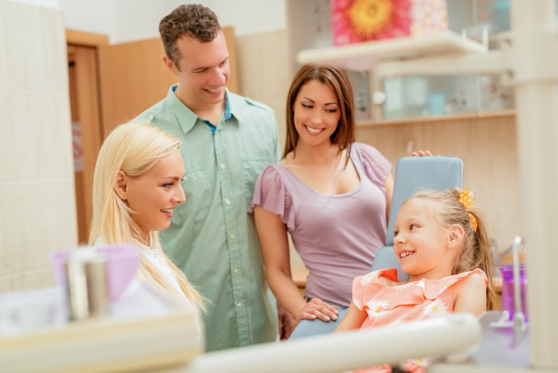 family sitting in the dentist’s office