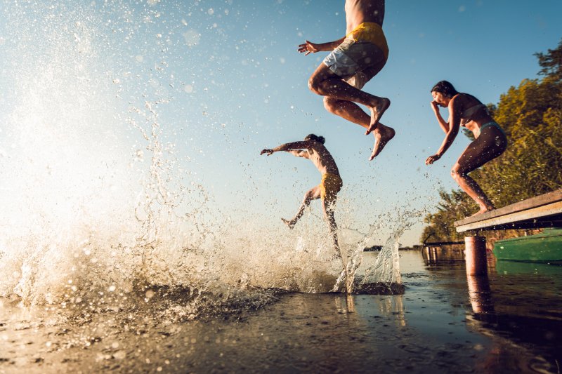 family playing on a beach